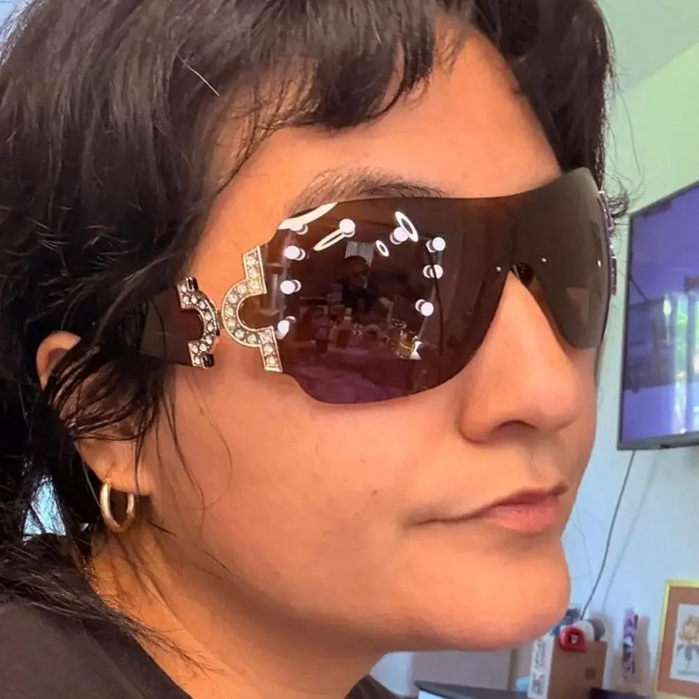 Brown shield sunglasses featuring oversized rimless lenses rhinestone luxe y2k